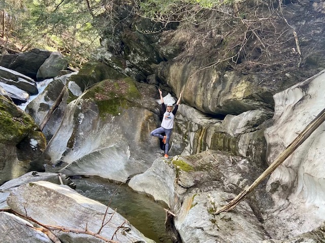 Yoga outdoors in nature on the river Vermont